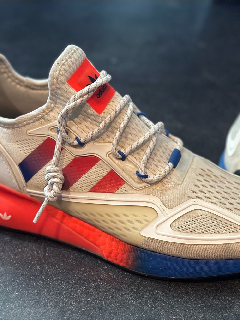 adidas white Athletic Shoe with Red-Orange & Blue Accents